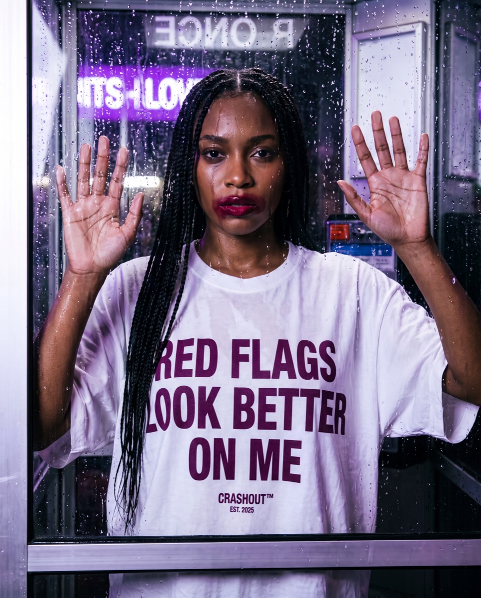 Cast member in the rain — Red flags tee